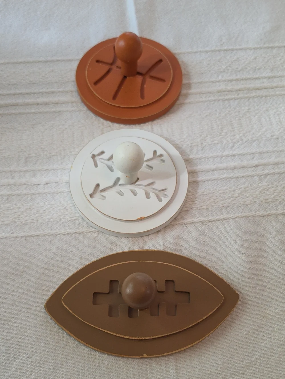 Decorative sports ball wood wall hooks for themed kids' rooms